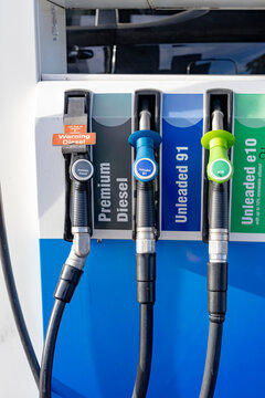 petrol and diesel bowser at a petrol station with fuel hoses