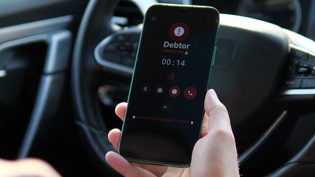 Close-up of an urgent call regarding an outstanding balance. Dark-themed mobile interface with an active timer inside a vehicle. Perfect for videos about financial crisis, personal loans, and debt