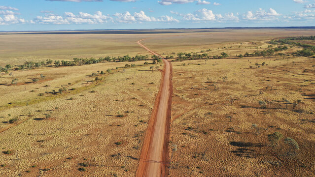 Drone shot of a dirt road post flood repair