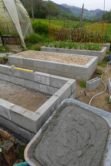 Fototapeta premium Building concrete block raised garden beds