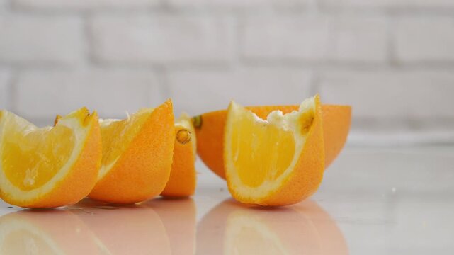 Blurred Shooting with an Orange Fruit Cutted in Slices, a Delicious and Sweet Vegan Dessert for Breakfast.