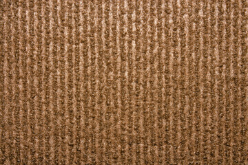 Fototapeta premium The texture is brown carpet.Self-adhesive scratching post for cats.Durable carpet for cats.