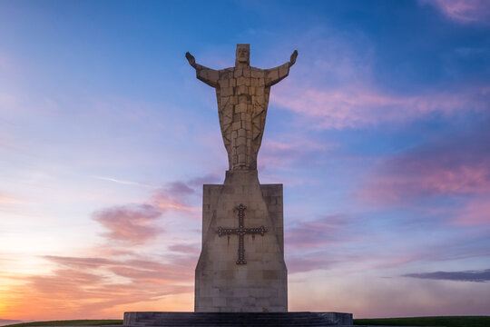 Sacred Heart of Jesus Statue on Mount Naranco at Sunset