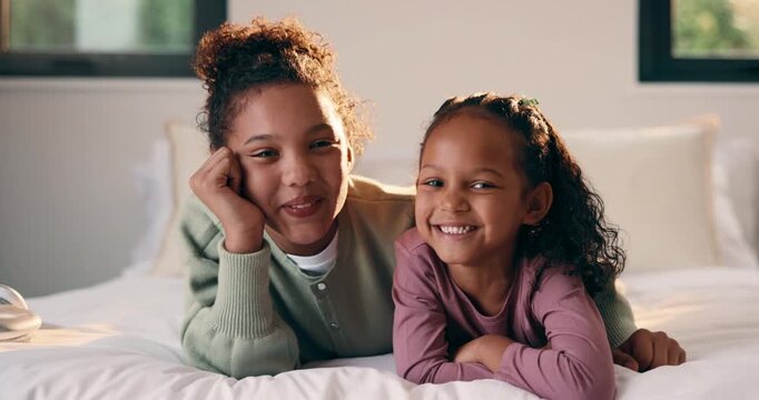 Bedroom, girl and face of siblings laughing with bonding, love and connection in home. Happiness, portrait and children relaxing, humor and funny for playful morning or weekend with comfort and hug