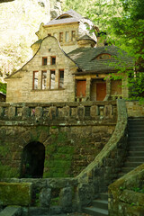 Obraz premium Dolsky Mlyn ruins in forest landscape, abandoned historic mill in Czech Republic, Europe travel and heritage concept