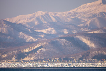 Landscape of drift ice floating on the ocean in Shiretoko Rausu Hokkaido Japan © shirophoto