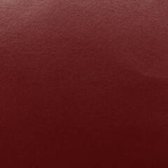 Fototapeta premium Rich maroon textured background with copy space