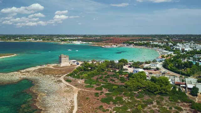 Aerial view of Torre Sant'Isidoro watchtower and beach in Nardo, Puglia, Italy.