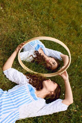 Enchanting moment with a beautiful woman in a vibrant nature setting inspired by Alice in Wonderland © Bliss
