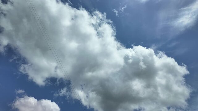 Time lapse clouds 4k rolling puffy cumulus cloud relaxation weather dramatic beauty atmosphere background dynamic pattern sky cloud