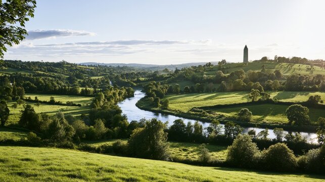 River Boyne winding through lush green Irish countryside with ancient round tower, scenic valley landscape
