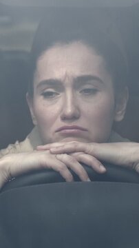Tired Driver Woman Resting Head On Wheel, Foggy Windshield, Hands Folded Over Steering, Eyes Closed, Strained Expression, Slow Cinematic Closeup Conveying Fatigue And Commute Burnout