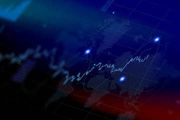 Obraz premium Stock market graph on computer screen with blue world map