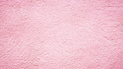 Fototapeta premium Wall with pink texture in a simple design showing unique patterns during daylight