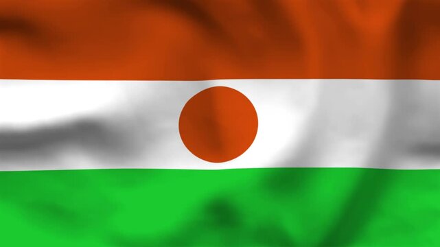 National flag of Niger on wavy cloth. Features orange, white, and green horizontal bands with a sun disk. Professional top-down perspective for African news and national independence day.