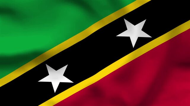 National flag of Saint Kitts and Nevis on wavy cloth. Features a black diagonal stripe with two stars and green/red triangles. Top-down view for Caribbean travel and holidays.