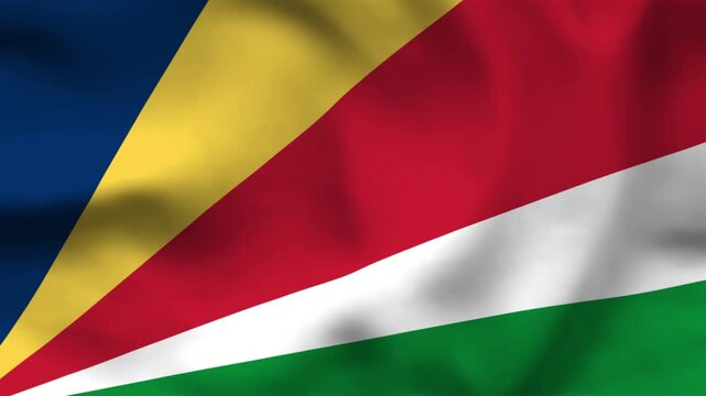 National flag of Seychelles on wavy cloth. Features five oblique bands of different colors. High-quality top-down view for tropical travel and national independence day.