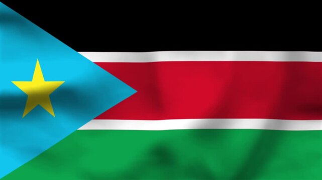 National flag of South Sudan on wavy cloth. Features horizontal bands and a blue triangle with a golden star. Top-down view for news, history, and independence day celebrations.