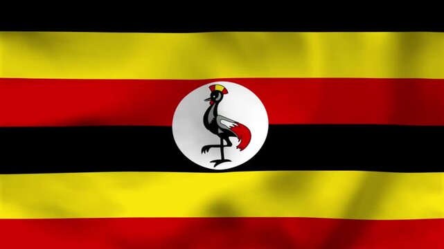 National flag of Uganda on wavy cloth. Features horizontal black, yellow, and red bands with a central bird symbol. Top-down perspective for African news and holidays.