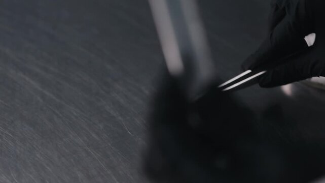 Taking surface swab sample on food production facility close up
