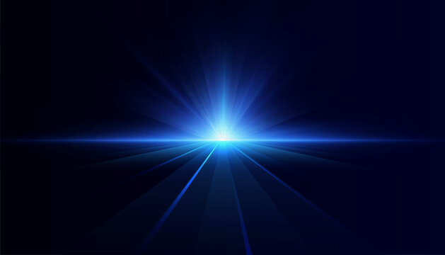 Blue light source creating a glowing futuristic horizon with converging lines. An abstract concept for technology and innovation