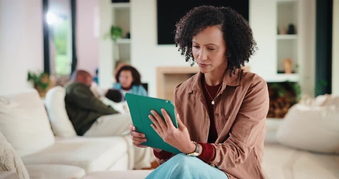 Tablet, typing and mother in home for remote work, article idea or inspiration for newsletter. Digital tech, copywriter and freelancer woman in living room for planning, story editing or feedback