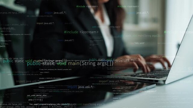 A focused programmer works on a laptop surrounded by streams of code, representing the dynamic environment of software development and technology innovation in a modern workspace.