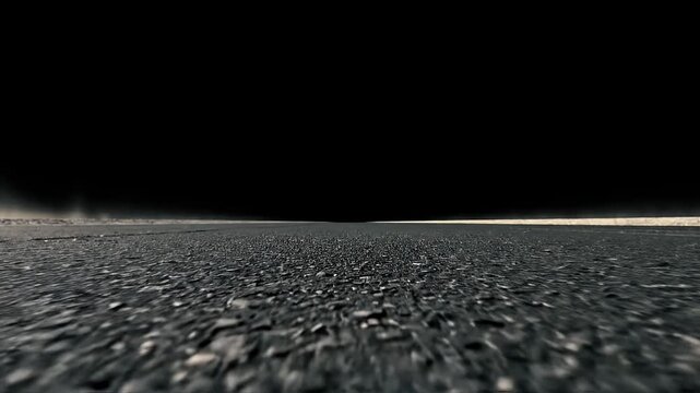 Road surface texture against dark sky horizon background