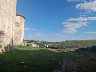 Fototapeta premium stone fortress wall under blue sky