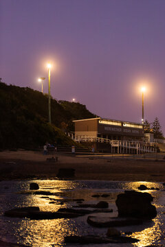 Merewether Ocean Baths building on coast at dusk