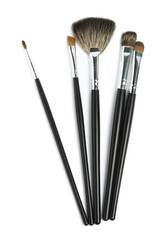 Fototapeta premium Set of makeup brushes isolated on white, top view