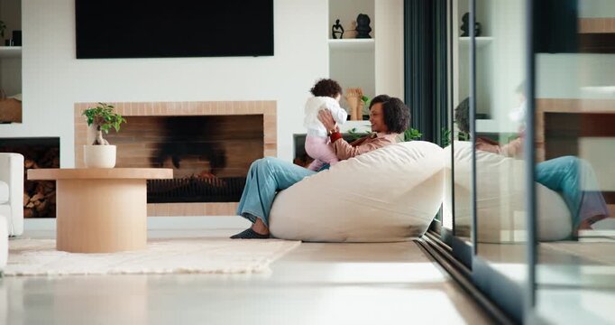 Baby, mother and playing on sofa in home together for bonding, development or family support. Happy, love and security of toddler with single parent woman in apartment living room for growth