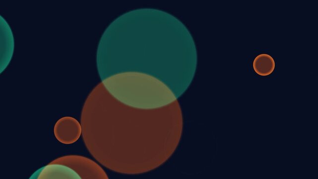 Vibrant colored circles overlap and shine in dark space