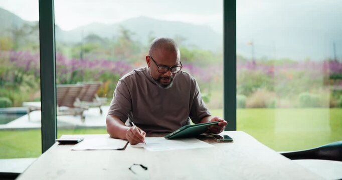 Tablet, document and mature man with home bills, accounting or financial report. Writing, planning and black person with paperwork, digital app and calculation for expenses, budget or savings