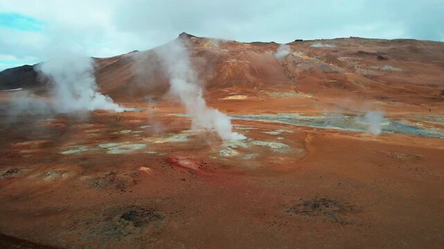 Dramatic aerial view of the Hverir geothermal area in Iceland. Hot springs, fumaroles, and steam vents creating a spectacular volcanic landscape