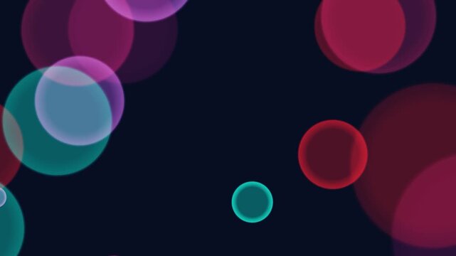 Vibrant colorful glowing orbs float in a dark space