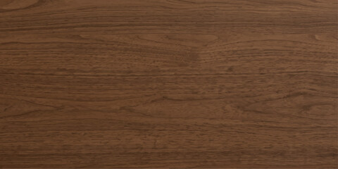 Obraz premium A close-up view of a rich, dark brown wooden surface, showcasing the natural grain and texture of the material, offering a warm and organic aesthetic.