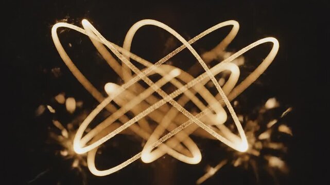 Sparkling light trails on black background.