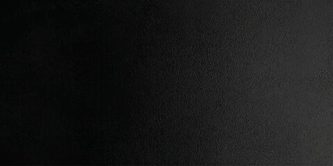 Obraz premium A black textured background suitable for graphic design, adding depth and sophistication to any project.