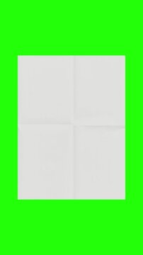 4k Resolution Vertical Video for Social Media: Paper Mockup Concept. Blank White Paper Sheet Unfolds Against Green Screen Chroma Key Background With Alpha Matte