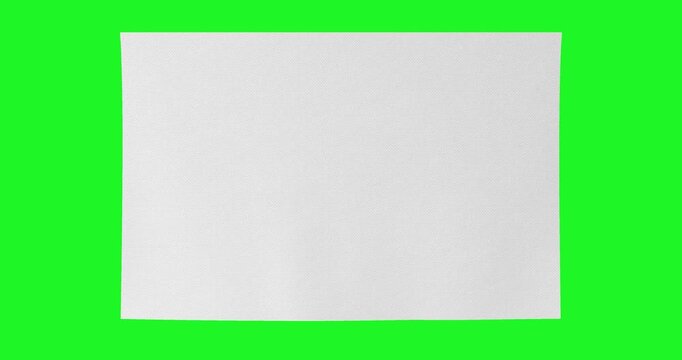 4k Resolution Video: Textile Material And Mockup Concept. Unrolled White Cloth Fabric Sheet With Subtle Texture On  Green Screen Chroma Key Background With Alpha Matte