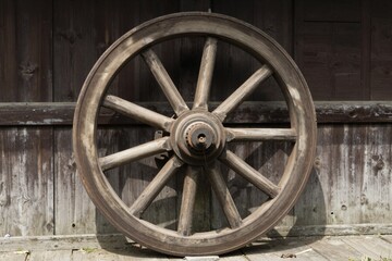 Fototapeta premium Rustic Wooden Wagon Wheel - Vintage Transport