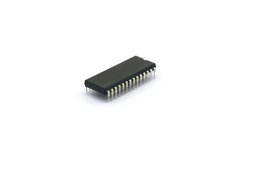 A blurry microcontroller on a white background. An archaic concept of technological advancement.