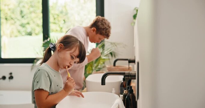 Bathroom, oral health and kids with toothbrush, brushing teeth and cavity prevention with toothpaste. Clean, mouth and children with dental care tools for fresh breath, wellness and hygiene in home