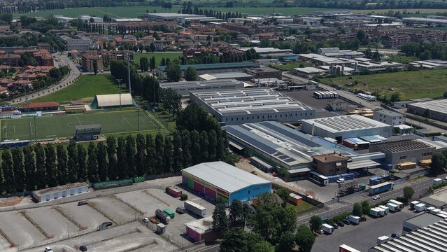 Industrial Park Aerial View: An aerial perspective showcases a sprawling industrial park with numerous factories, warehouses, and administrative buildings.