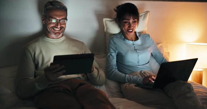 Night, remote work and couple with tech in bedroom, creative and plan for ebook chapter with tablet. Happy, writer and mature people with laptop for story development, home and novel deadline on web