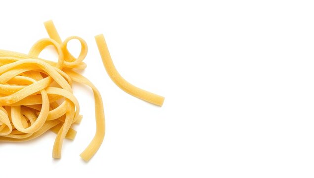 Close-up of fettuccine on a white backdrop.