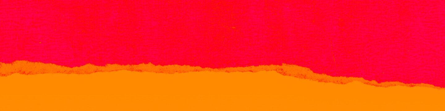 Bold neon magenta pink paper over vivid orange with rough torn edge dividing line, high contrast abstract art, wide horizontal format