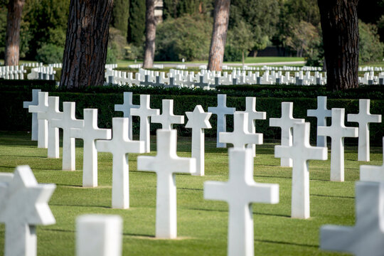 Sicily Rome American Cemetery White Marble Crosses and Stars of David Headstones World War II Military Memorial in Nettuno near Anzio Italy