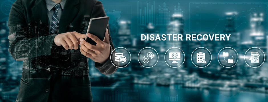 Businessman focused on mobile device explores disaster recovery strategies in an urban setting, symbolizing data management, security, and business continuity. Ledger